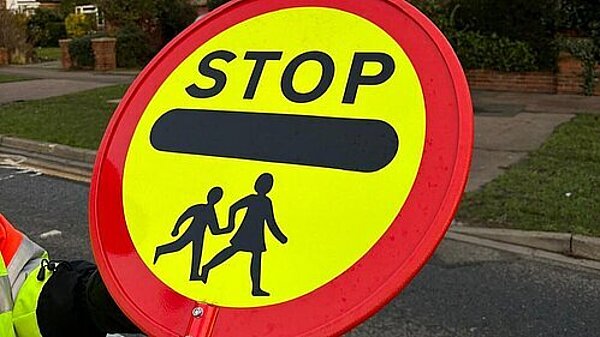 Keep our school safety patrol Don't cut our Lollipop Man